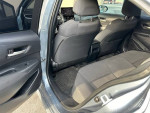 Back seat area of a 2020 Toyota Corolla LE FWD, featuring spacious interior and clean upholstery.