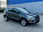 2017 Ford Escape S FWD with low mileage, excellent condition, and new tires parked outside.