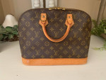 Louis Vuitton bundle of bags/wallets