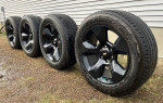 Chevrolet Silverado 20 inch black rims with tires for sale